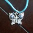 vend-collier-fantaisie-avec-pendantif-papillon-bleu