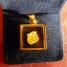 medaillon-avec-feuille-d-or-inseree-18-carats-avec-certificat-d-autenticite-tailledu-medaillon-15mm
