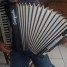 accordeon-touches-piano