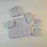ensemble-tricot-bebe-modele-layette-tricote-main-sur-opla